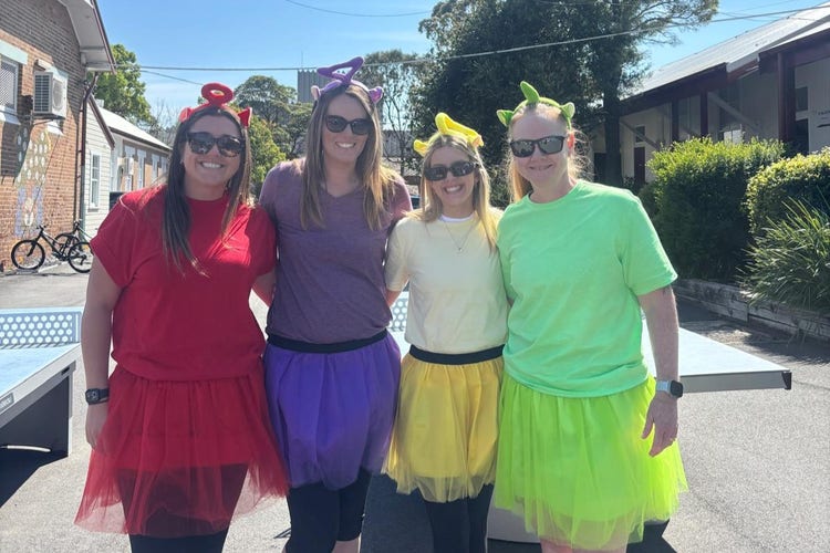 Fun photo of frour teachers dressed up for book character parade