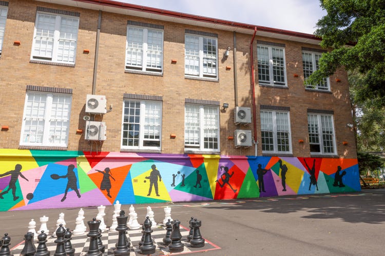 Photo of playground and school building